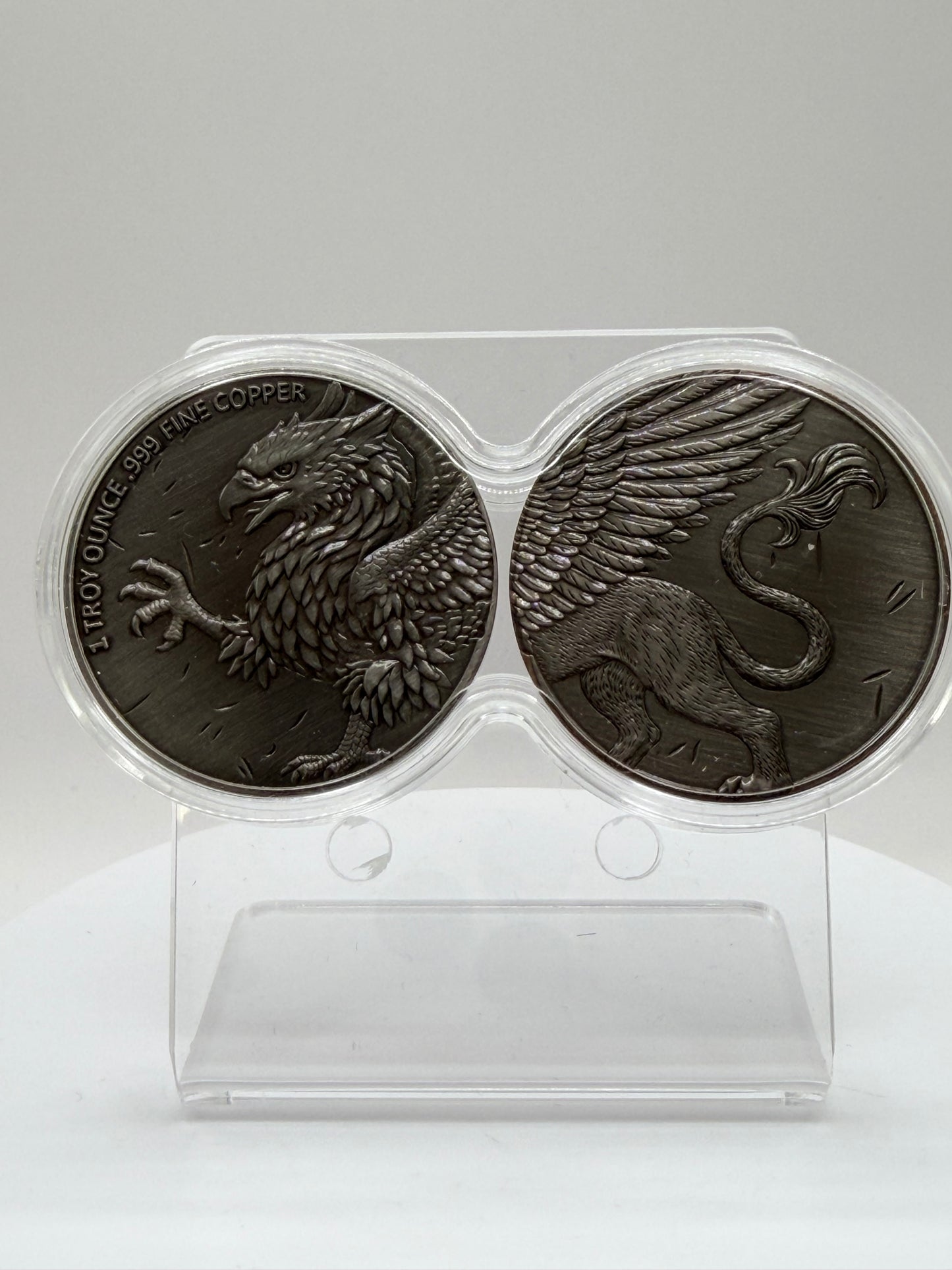 antiqued griffin copper rounds in connected capsule holder