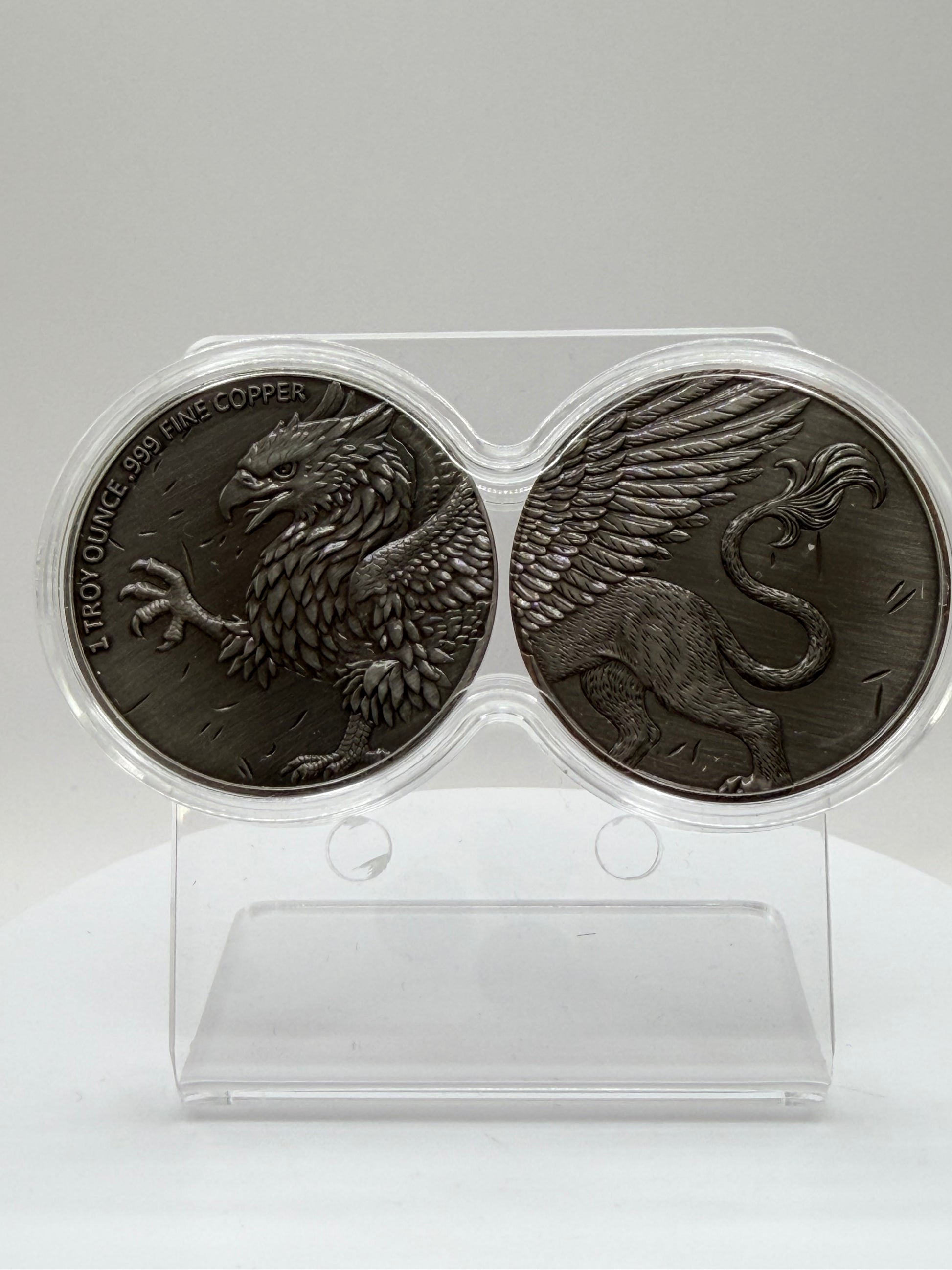 Antiqued Griffin copper rounds in connected capsule holder