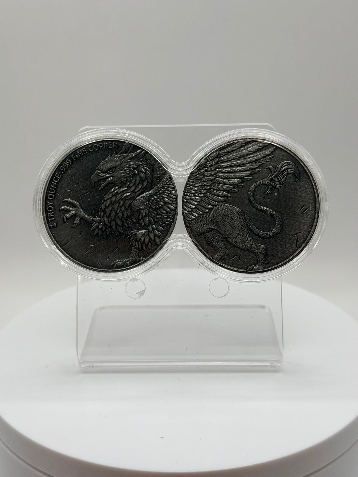dual griffin .999 fine copper rounds in infinity capsule display