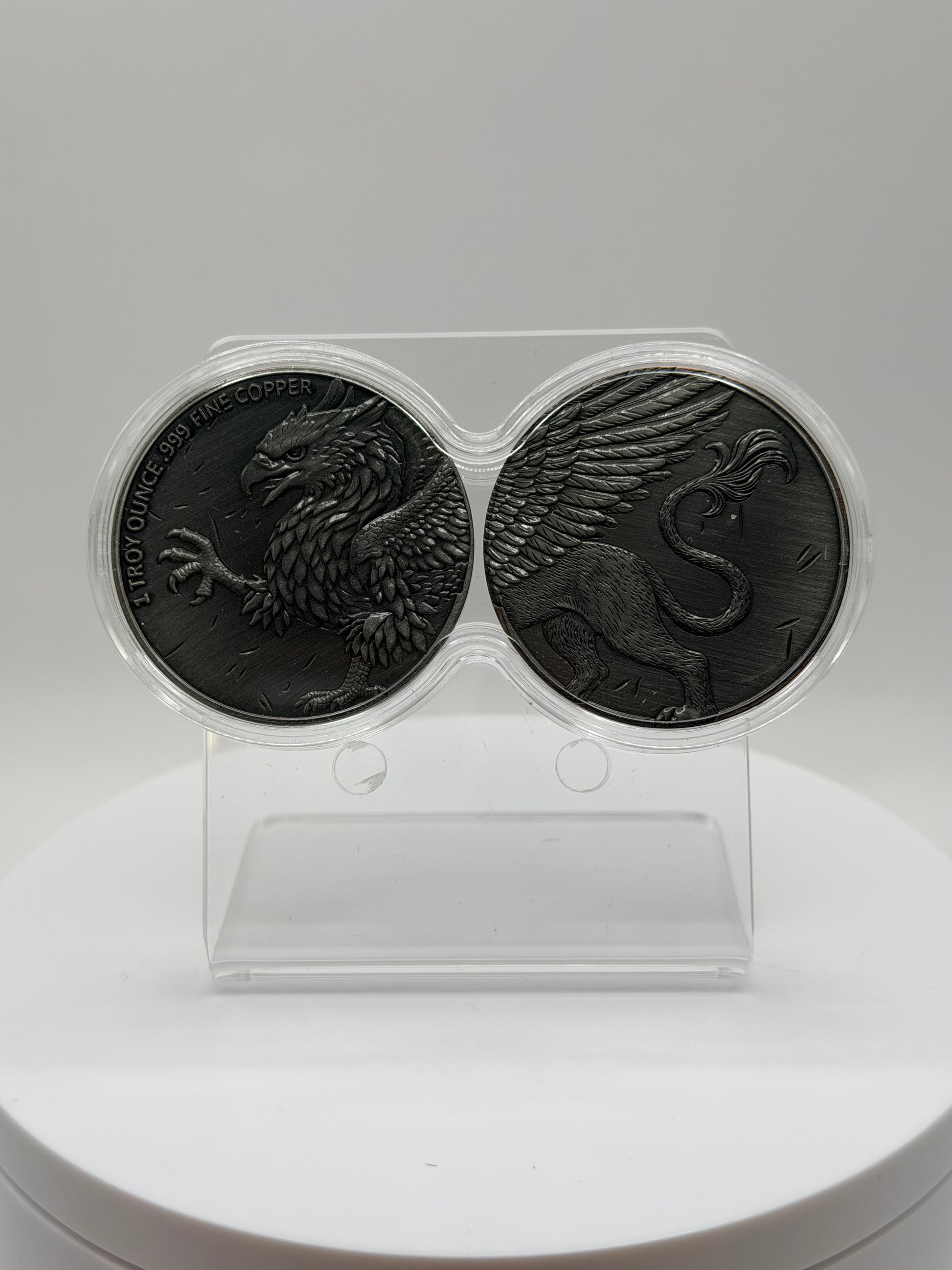 Dual Griffin .999 fine copper rounds in infinity capsule display