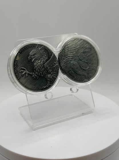 Mythical Griffin copper coin set with detailed feather design