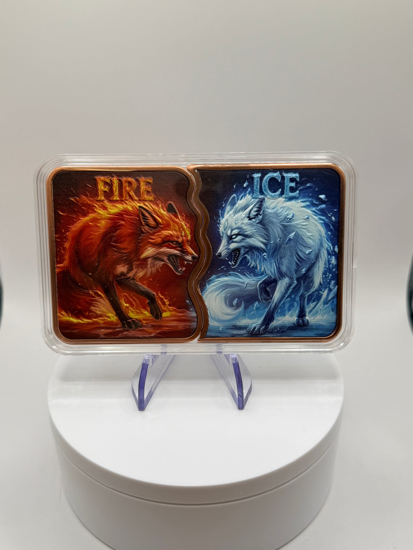 colorized copper bullion bar featuring fire wolf and ice wolf artwork