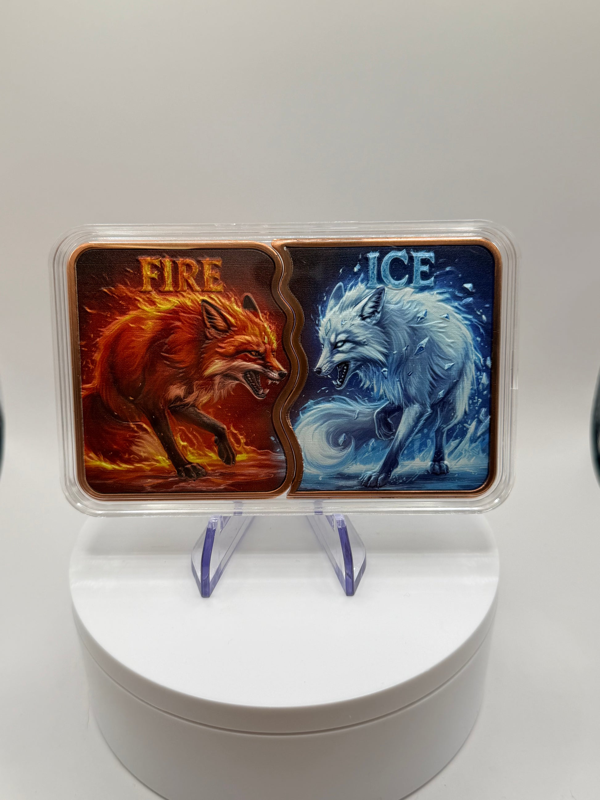 Colorized copper bullion bar featuring fire wolf and ice wolf artwork