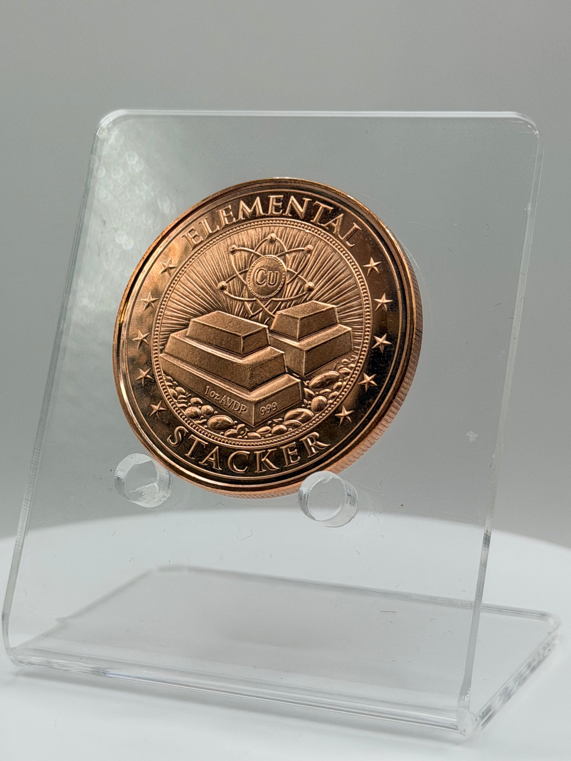 Macro photo of HighDesertMint skull reverse copper round with In Metal We Trust design